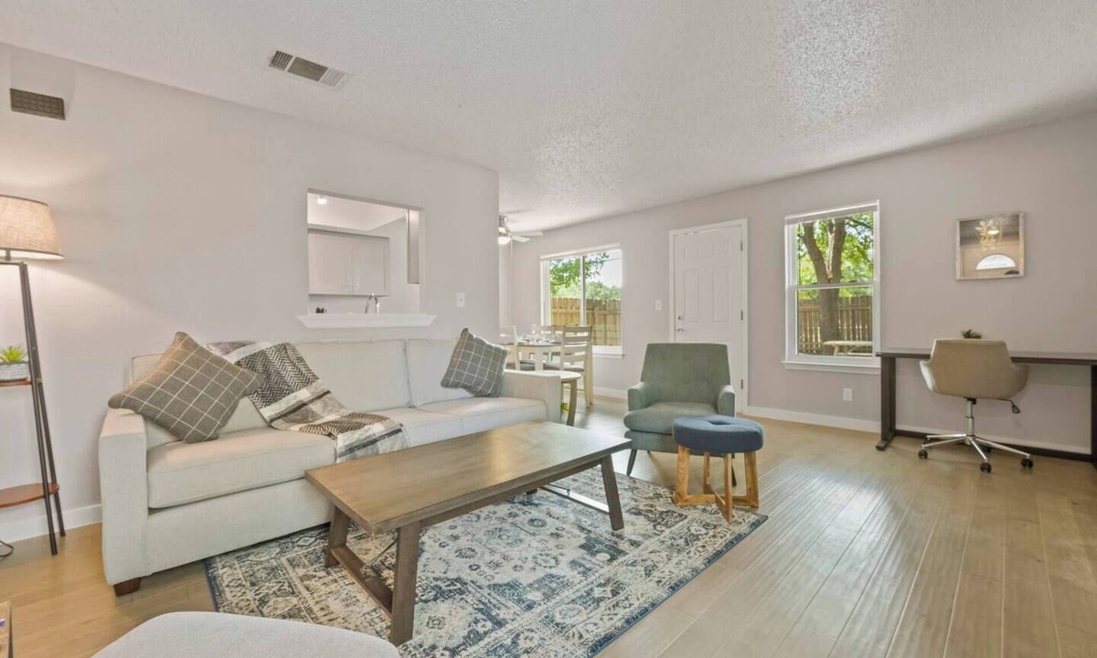 Springwoods Apartment | Airy and cheerful, newly renovated home is your sanctuary in bustling North Austin! 1,100+ SF of living area with roomy walk-in closets and large private backyard let you unpack and unwind.