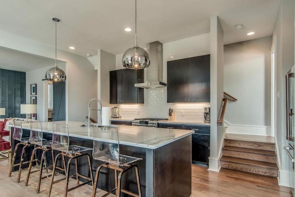 Edgehill House | Amplify at the Gulch modern 3 story condo 2 car garage rooftop fire pit security and view