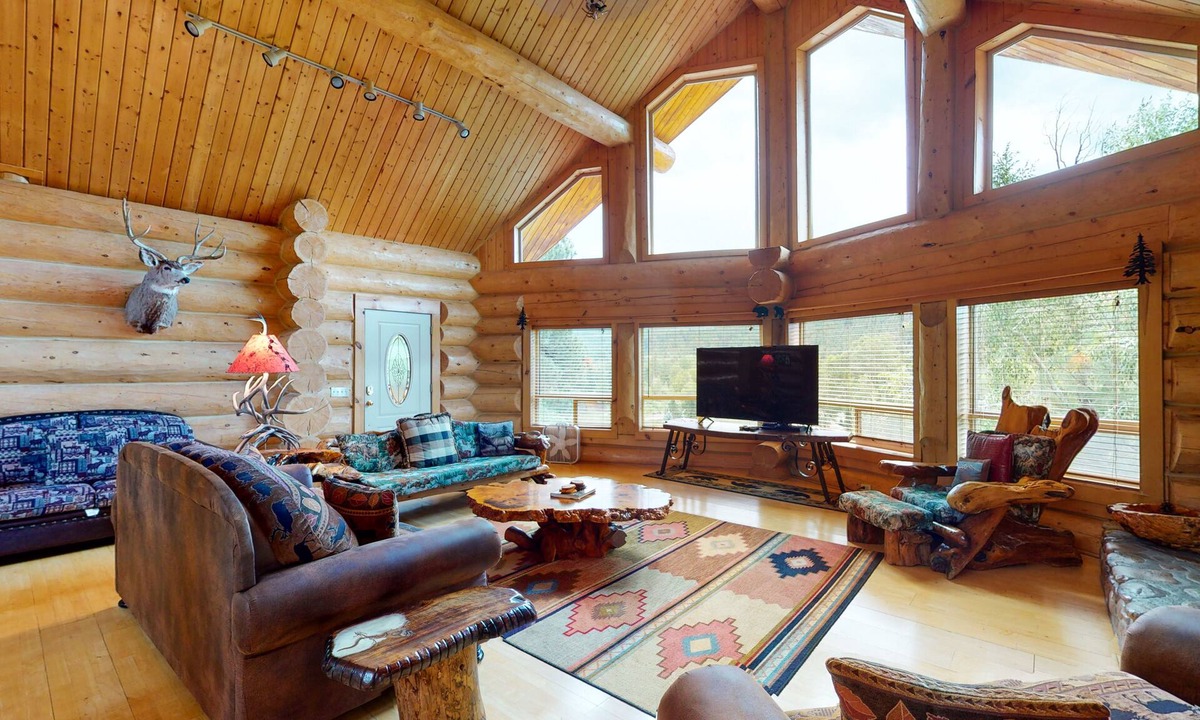 San Juan River Village Cabin | Beautiful Riverfront Log Cabin with Mountain Views, Firepit, and Gas Grill