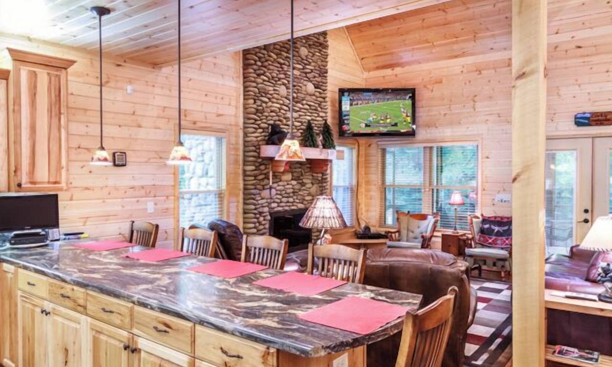 Cosby Cabin | Creekfront cabin with cozy interiors, hot tub & game room.