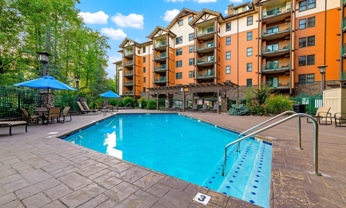 Gatlinburg Condo | Elegant pool-view condo with free attraction tickets, balcony, & hot tub/pool