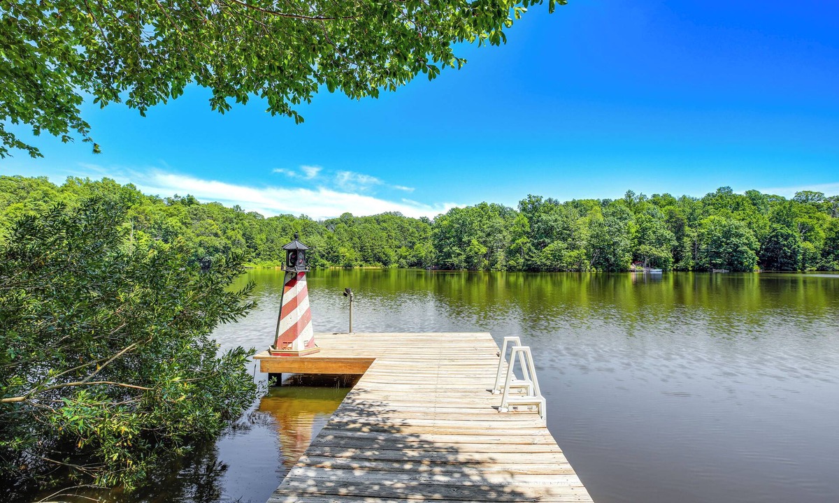 Chesapeake Ranch Estates-Drum Point Cabin | Lakefront Lusby Home w/Fire Pit: 3 Mi to Beach!
