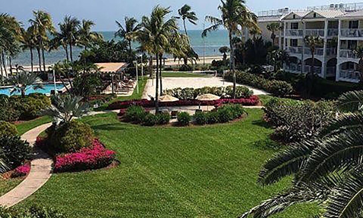 Key West Resort | Luxurious top floor, end unit, within premier resort on the Atlantic Ocean.
