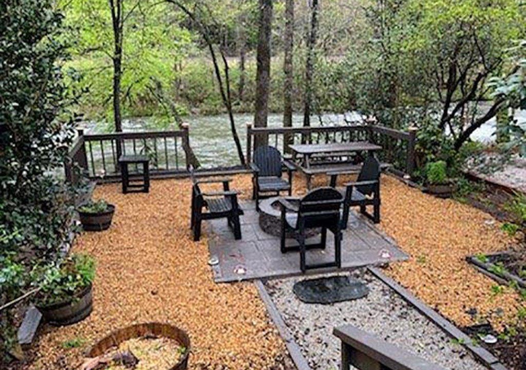 East Ellijay Apartment | Luxury Riverfront Getaway with Fire Pit and Private Deck