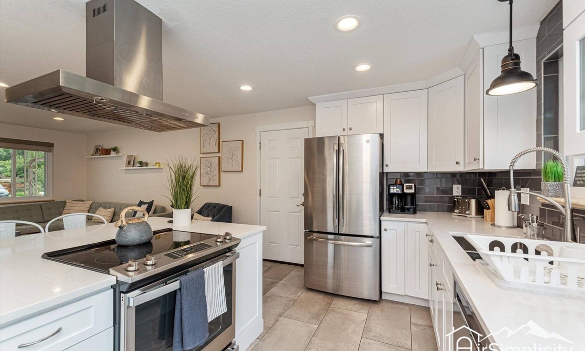 Northwest Arvada House | Mod-Chic Retreat Lux Kitchen Game Rm Patio