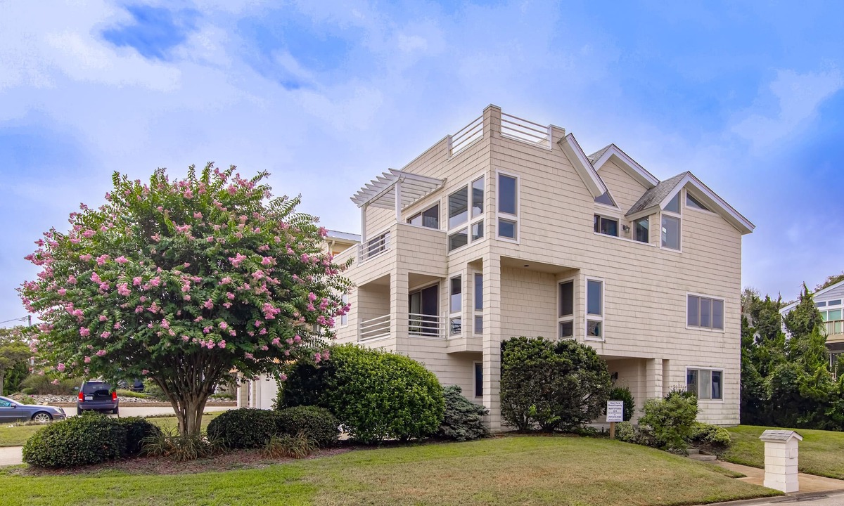 Croatan Beach House | Ocean-view home that is within a 2 minute walk to the beach w/rooftop deck