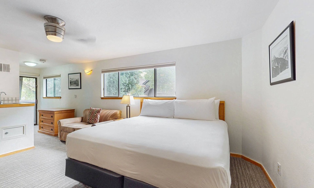 West End Apartment | Private balcony room on Main St - pool & hot tub - walk to lifts, dog-friendly
