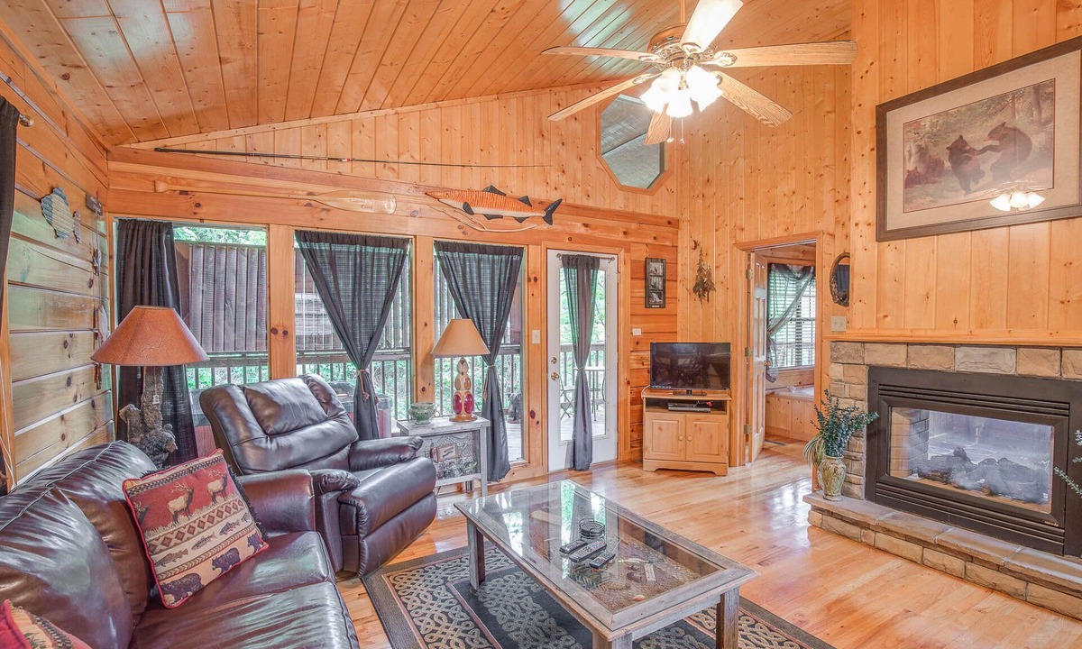 Sevierville Cabin | Romantic escape in the woods w. hot tub, fireplace + indoor pool access