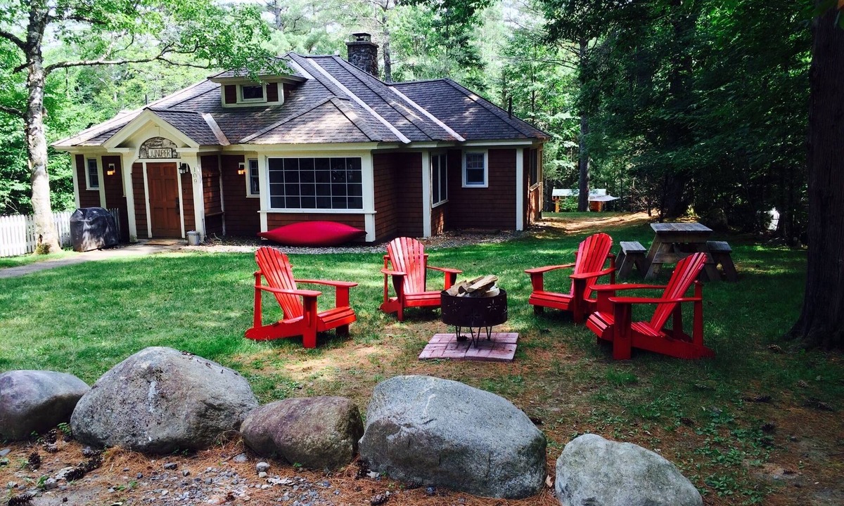 Lake Placid Club House | Short walk to village.with private wooded setting. EV Charger in parking area.