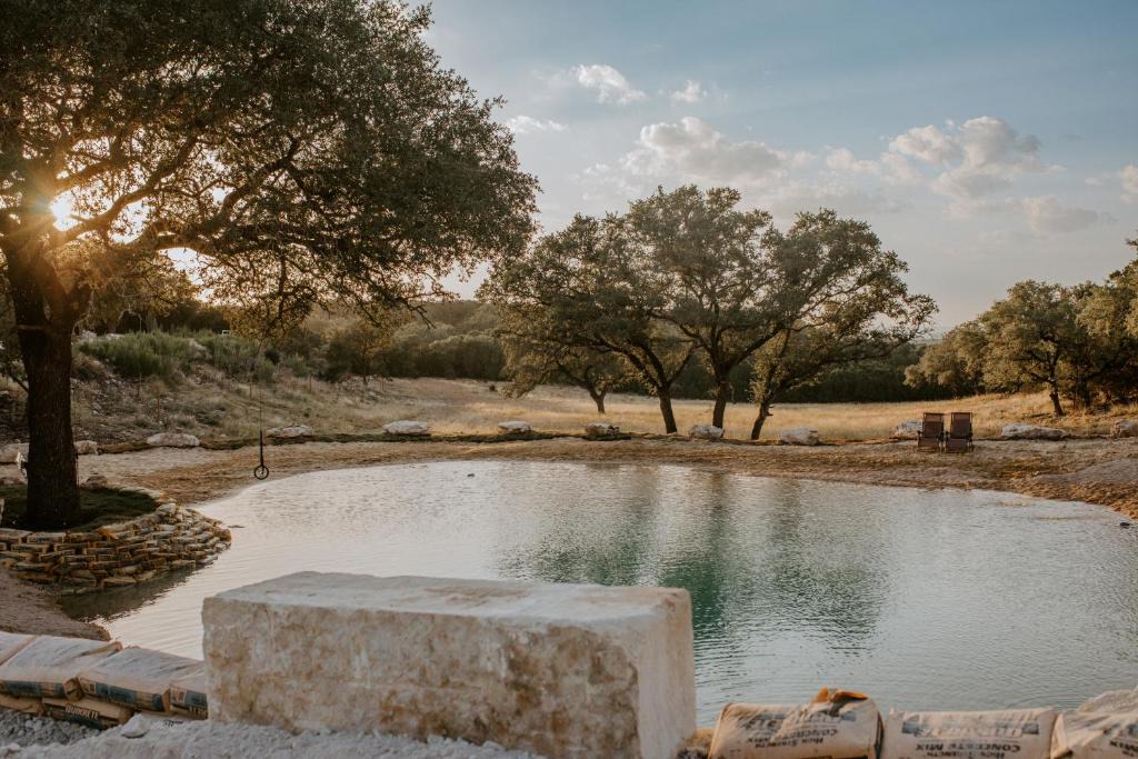 Spring Branch House | The Roost Farmhaus on 20 acres, hill country view, firepit, swimming hole