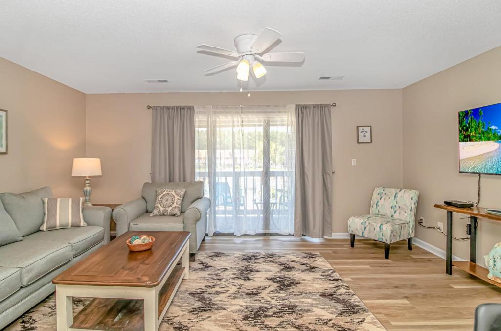 Surfside Beach House | Updated Second Floor Condo - 1 Bedroom - Only 2 Miles To The Beach! Golf Colony 17-G