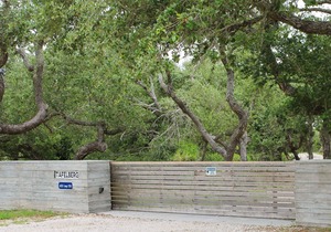 3 bedroom 2 bath nestled in the oak trees right on Copano Bay! Private Pier!