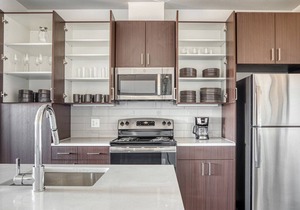 Airy Five Points 2BR w/ Roof Deck & Gym, walk to RiNo bars, by Blueground