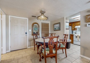 Bay-view all-suite condo with pool & fishing dock - walk to beach