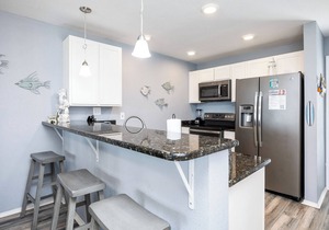 Beachfront Condo Steps from the Sand with Pool, Hot Tub, & Private Balconies
