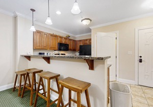 Central condo with private balcony, free attraction tickets, & pool/hot tub