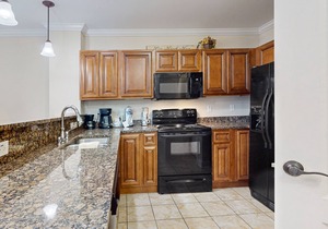 Central condo with private balcony, free attraction tickets, & pool/hot tub