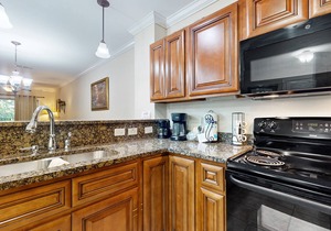 Central condo with private balcony, free attraction tickets, & pool/hot tub