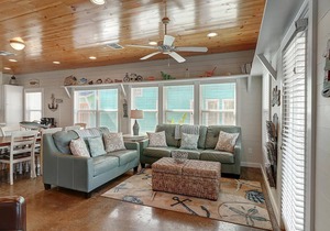 Come spend a little "Island Time" in this 3 bed 3 1/2 bath home!