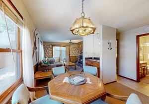 Comfortable condo with mountain views, patio, & easy ski access
