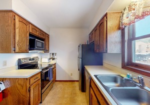Comfortable condo with mountain views, patio, & easy ski access