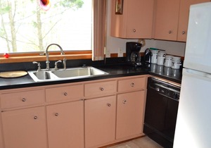 Cozy cottage style home on East Grand Traverse Bay in Elk Rapids. A/C.