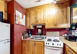 Cozy, Third-Floor Condo Near the Slopes w/ Free WiFi, a Wood Stove, & Views