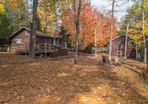 Delightful lakeside cottage on Little Saint Germain with private dock and sandy