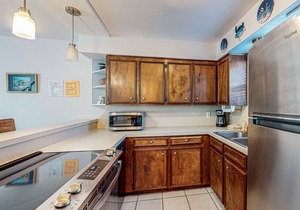 Dog-friendly condo with WiFi, hot tub, & pool - minutes from beach