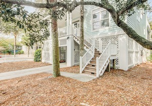 Elegant home on the boardwalk with 2 balconies & shared pools - walk to beach