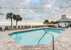 Elegant home on the boardwalk with 2 balconies & shared pools - walk to beach