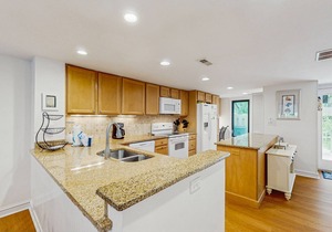 Family-Friendly Townhome with Shared Pool, Golf Course Views, and Beach Access
