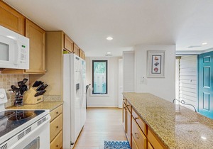 Family-Friendly Townhome with Shared Pool, Golf Course Views, and Beach Access