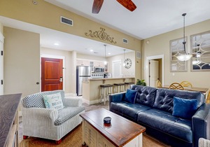 Ground-floor condo with patio, central AC, shared pool, & tennis