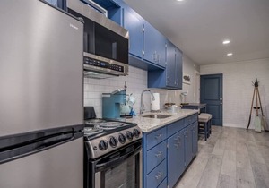 Lakeside Serenity: 1BD Villa with Private Deck