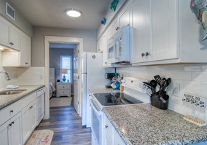 Located right by the large heated pool. Only a block to the beach!