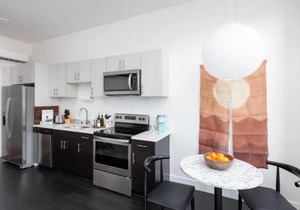 Modern 1BR Apt with Skywalk to Fiserv, Rooftop, and Parking