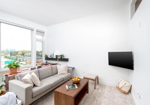Modern 1BR Apt with Skywalk to Fiserv, Rooftop, and Parking