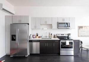 Modern 1BR Apt with Skywalk to Fiserv, Rooftop, and Parking