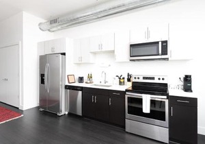 Modern 1BR Apt with Skywalk to Fiserv, Rooftop, and Parking