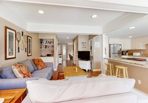 Modern, light-filled villa with 2 living areas, pool, easy beach access, & patio