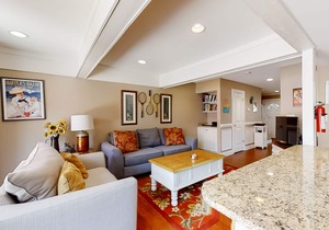 Modern, light-filled villa with 2 living areas, pool, easy beach access, & patio