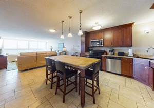 Penthouse condo with panoramic views, outdoor pool, & sundeck