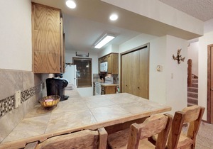 Relax in mountain view condo with nordic skiing and tubing nearby