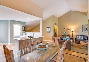 Renovated townhome next to golf course w/community pool access- close to beach