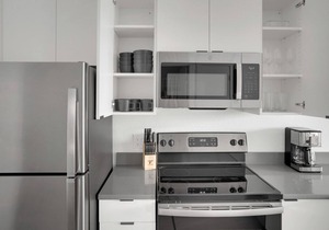 Sleek Sloan's Lake 1BR w/ Gym, W/D & Roof Deck, near Park, by Blueground