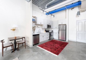 Spacious 1BR Near Fiserv with Rooftop, Gym, and Parking