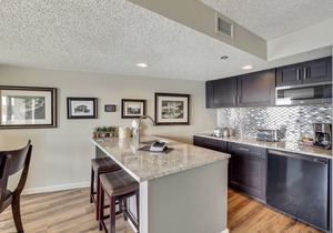 Waterfront Condo in Downtown Charlevoix | Pool, Hot Tub, Sauna | Sleeps 4