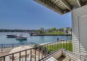 Waterfront Condo in Downtown Charlevoix | Pool, Hot Tub, Sauna | Sleeps 4