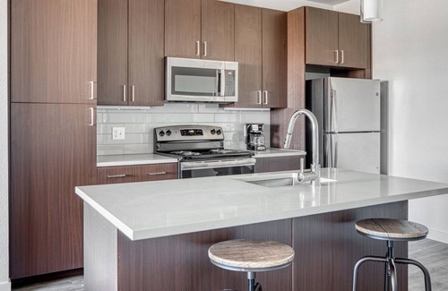 Five Points Apartment | Airy Five Points 2BR w/ Roof Deck & Gym, walk to RiNo bars, by Blueground